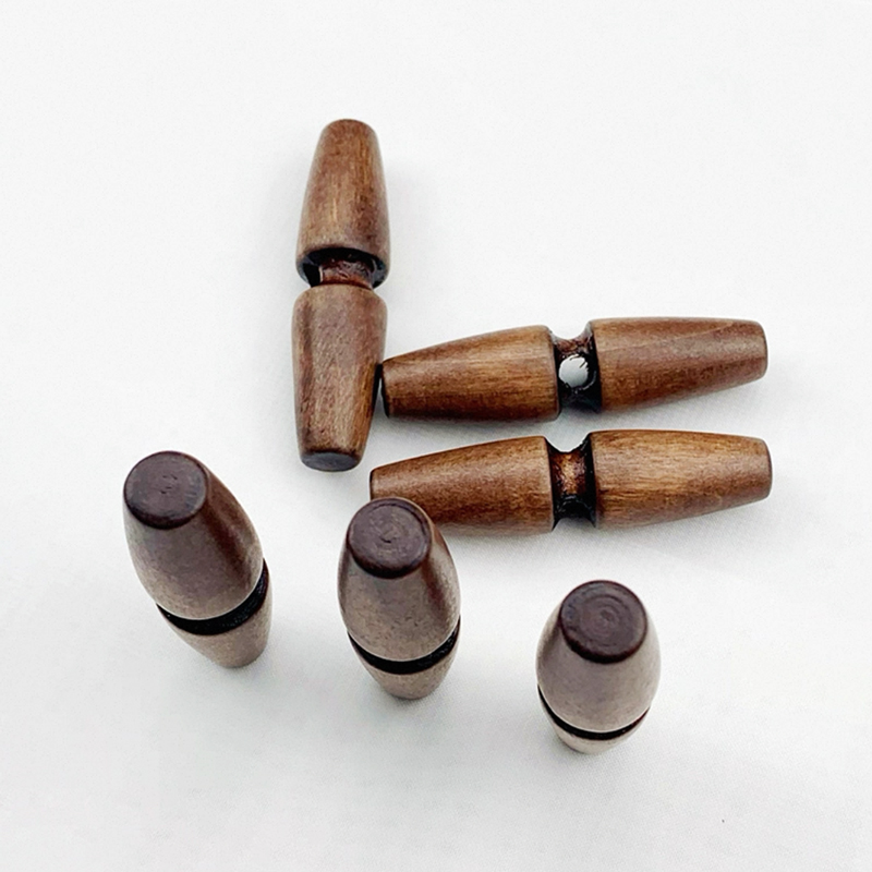 木头单孔牛角扣